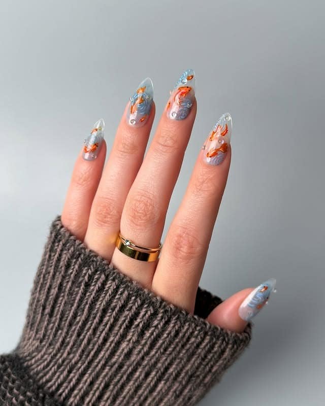 21. Crystal Koi Pond Stilettos - summertime nail ideas