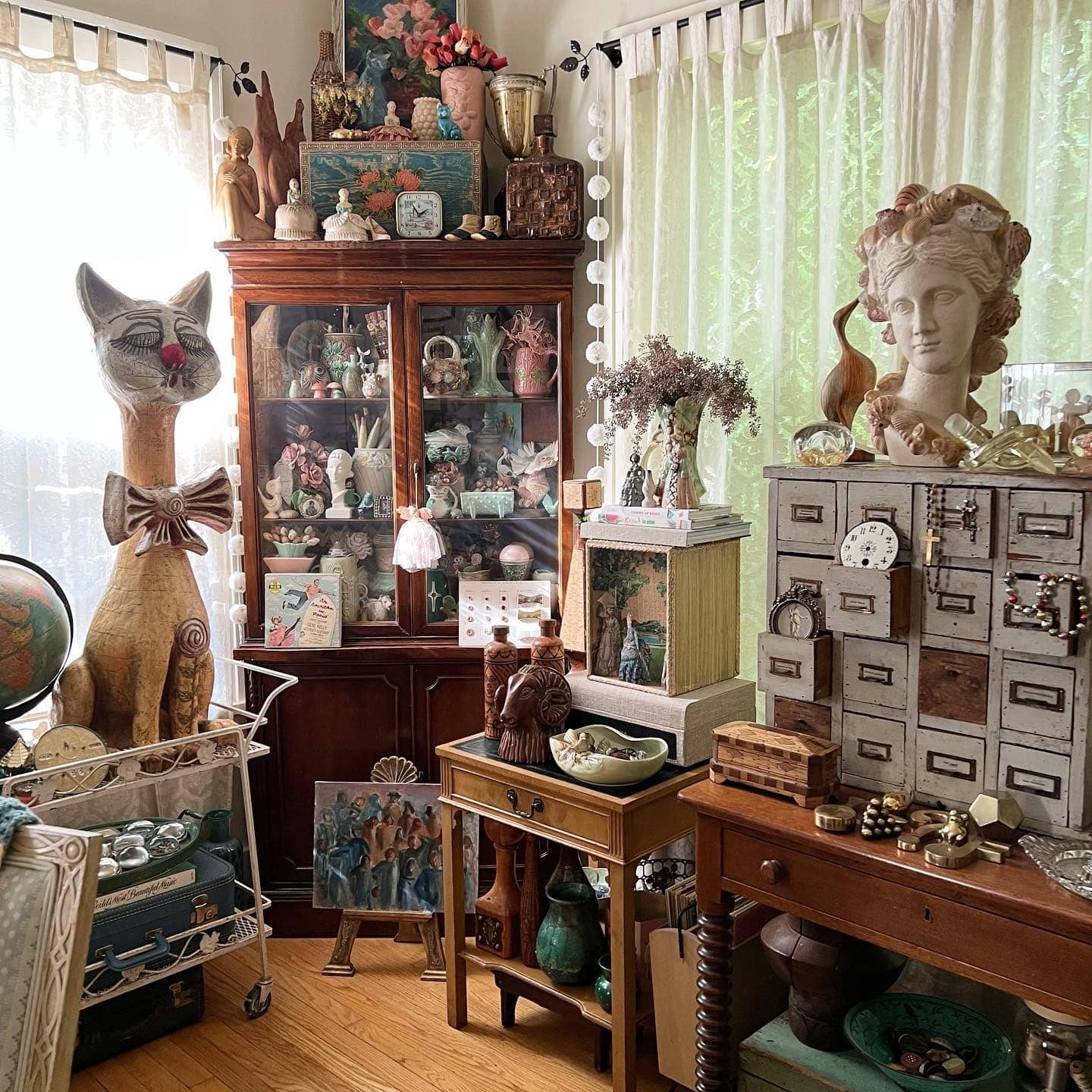 7. Eclectic Vintage Collector’s Corner - living room corner ideas
