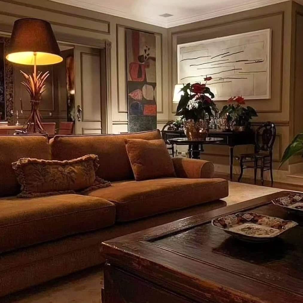 21. Moody Earth Tones with Classic Detail - living room corner ideas