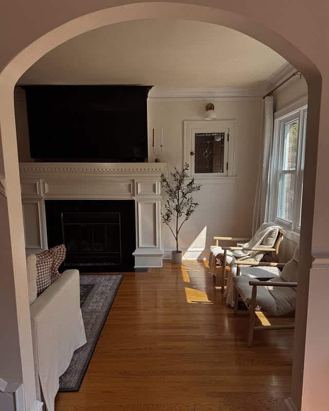 11. Warm Ivory Fireplace Nook with Soft Neutrals - paint ideas for living room