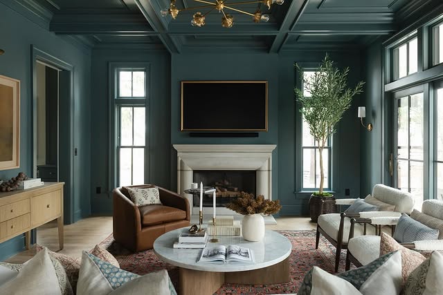 14. Deep Teal Living Room with Statement Wood Tones - paint ideas for living room