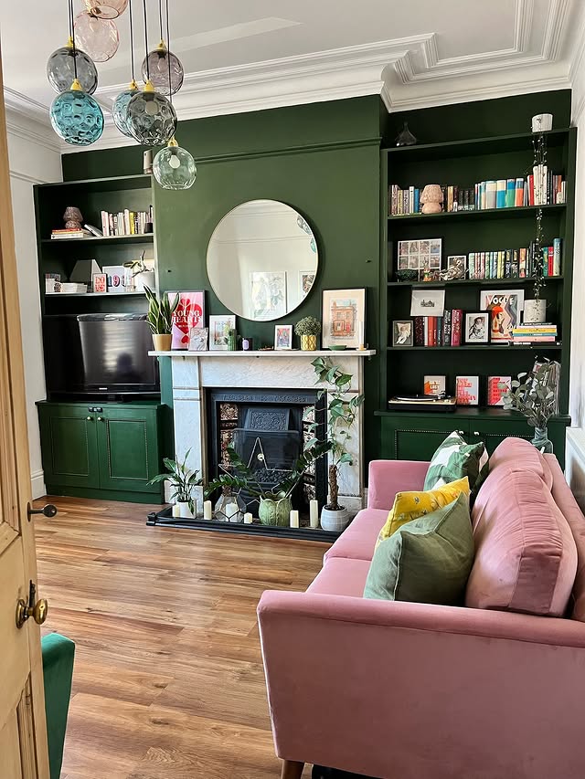 15. Forest Green Built-Ins with Blush Upholstery - paint ideas for living room