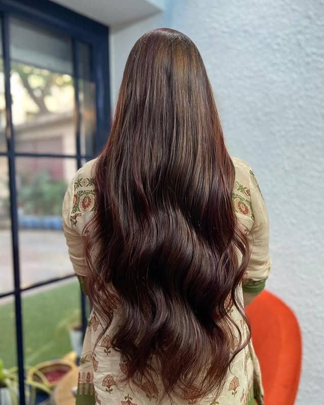 6. Rich Espresso Curls with Light Maple Veil - Red Brown Hair with Highlights