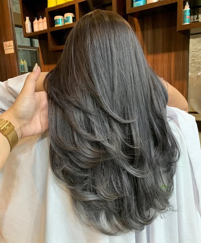 8. Voluminous Smoky Ash Brown Layers - Dark Ash Brown Hair Color