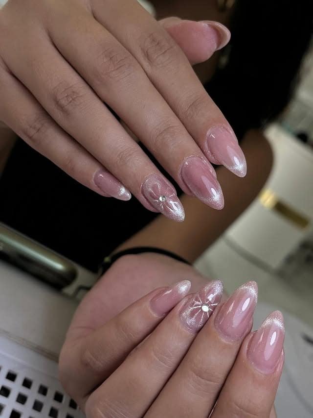 1. Soft Pink Chrome Almond Nails with Pearl Bloom Accents - turkey nail ideas