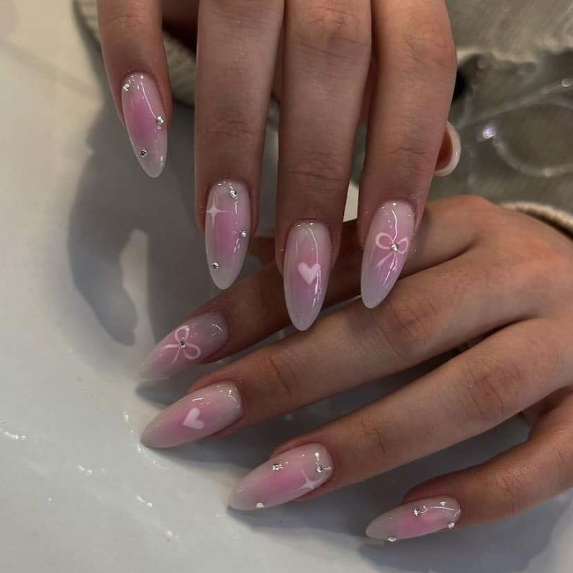 5. Pink and White Gradient Nails with Tiny Hearts and Bows - turkey nail ideas