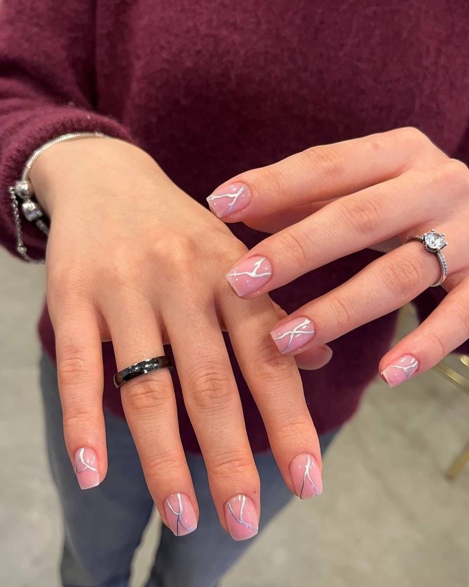 15. Soft Pink Short Nails with Silver Lining Accents - turkey nail ideas