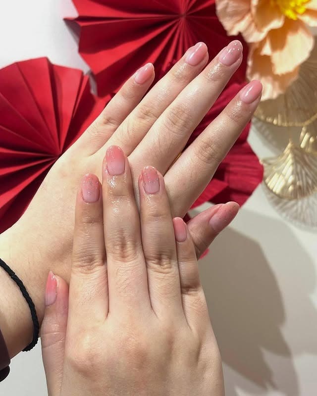 12. Soft Pink Sheer Fade Minis - two tone nail ideas