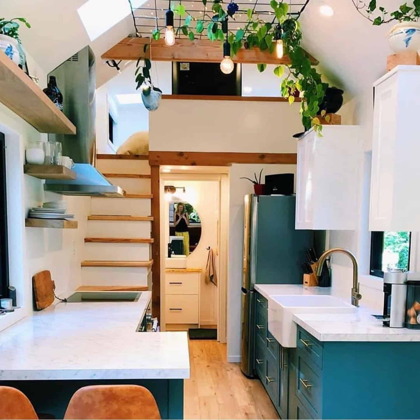 3. Bright Two-Tone Kitchen With Teal Cabinets - tiny house kitchen ideas