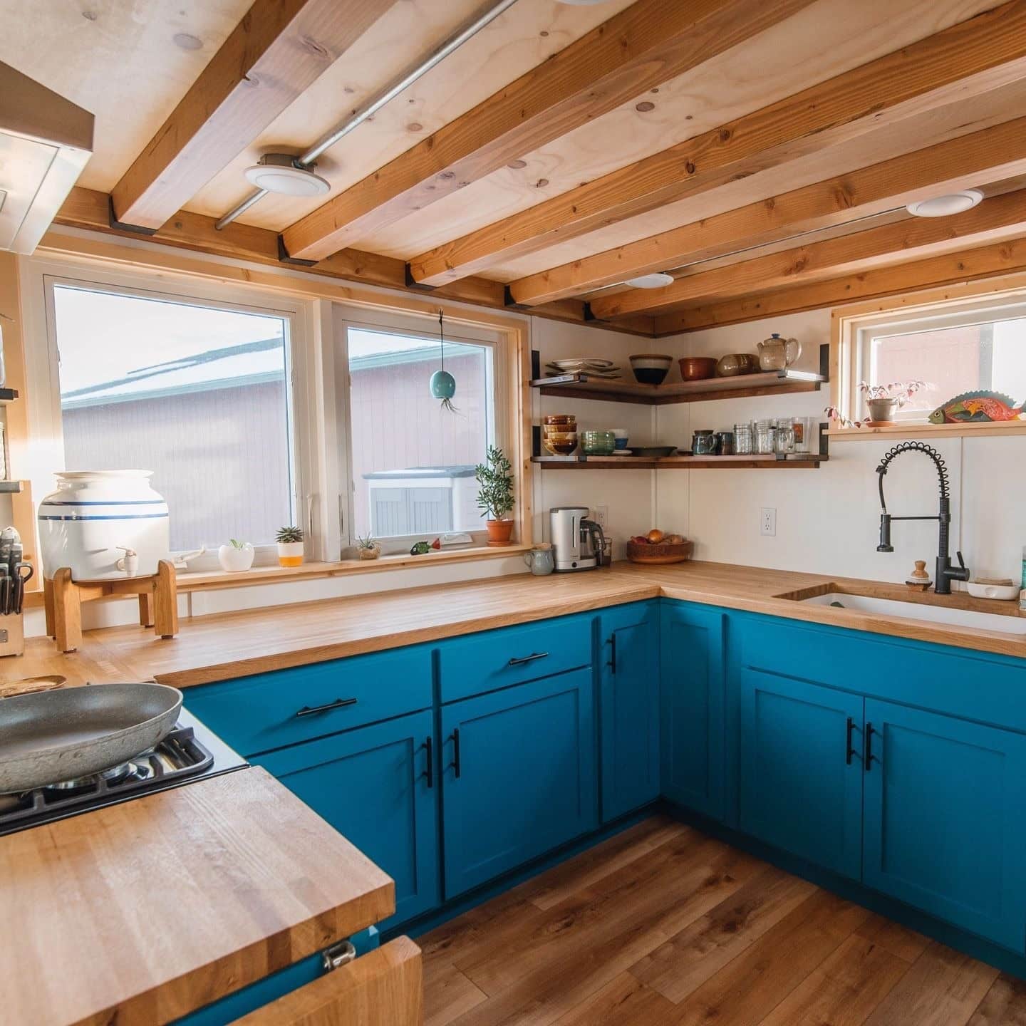13. Blue Cabinet Kitchen With Exposed Beam Ceiling - tiny house kitchen ideas