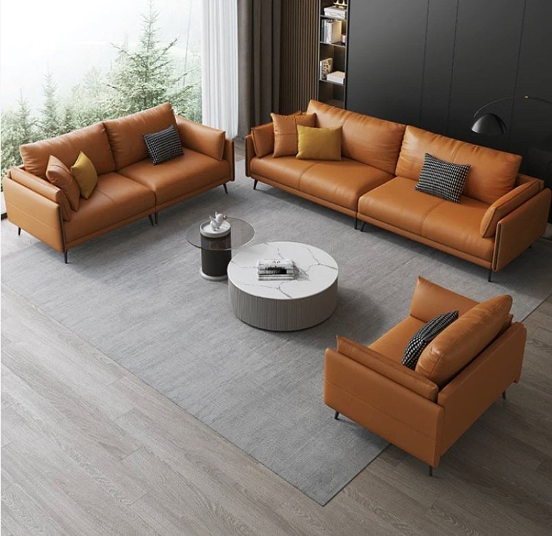 16. Caramel Leather Trio With Clean Geometry - living room sofa ideas