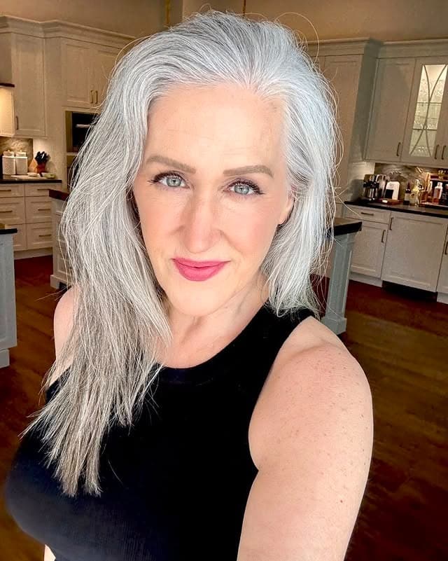 9. Bright Silver Straight Look with Root Depth - Gray Hairstyles for Women