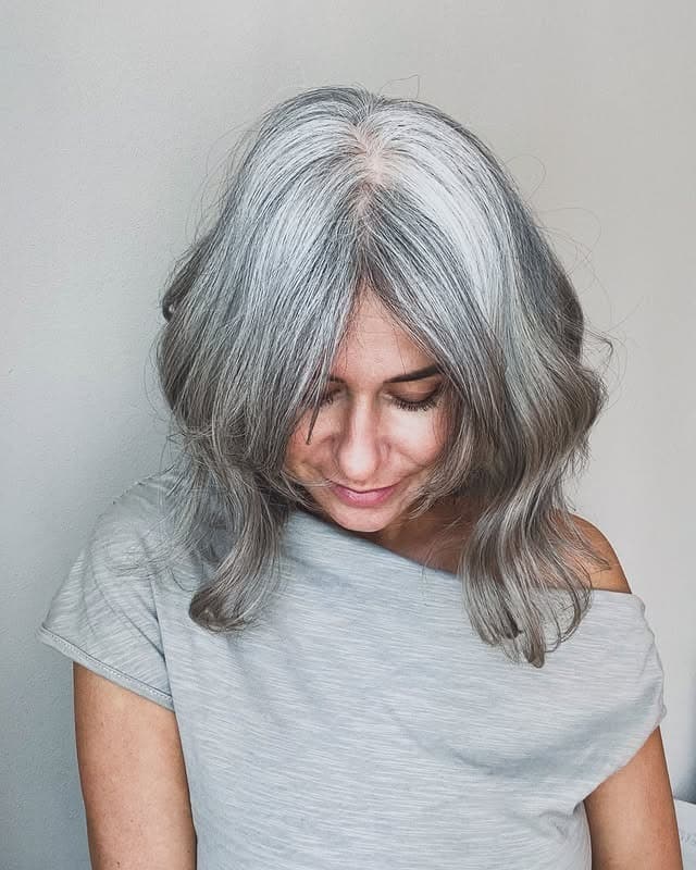 10. Soft Gray Mid-Length Waves with Natural Part - Gray Hairstyles for Women