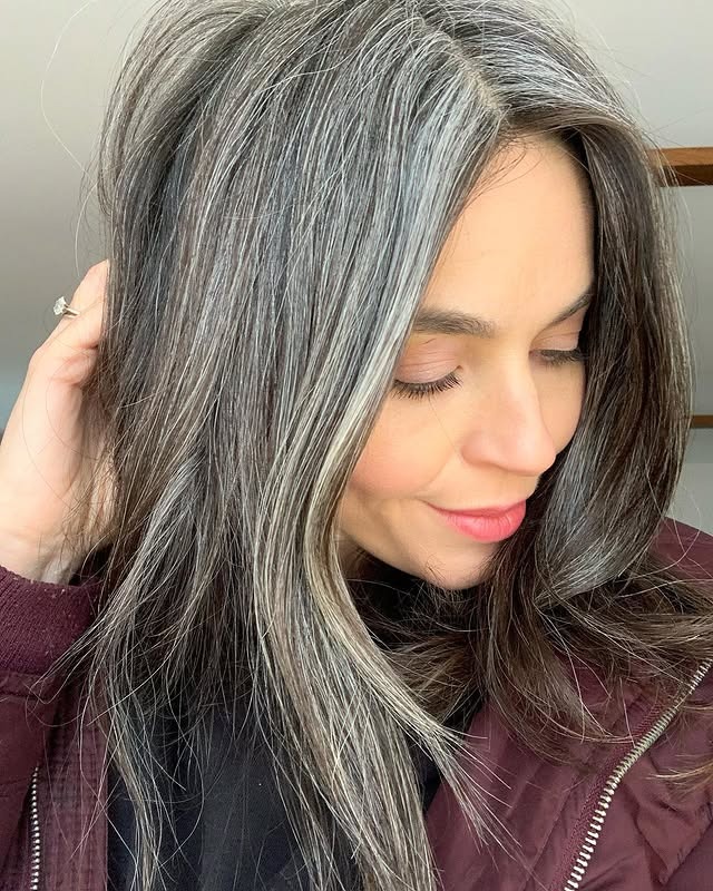 15. Textured Medium-Length Gray with Subtle Highlights - Gray Hairstyles for Women