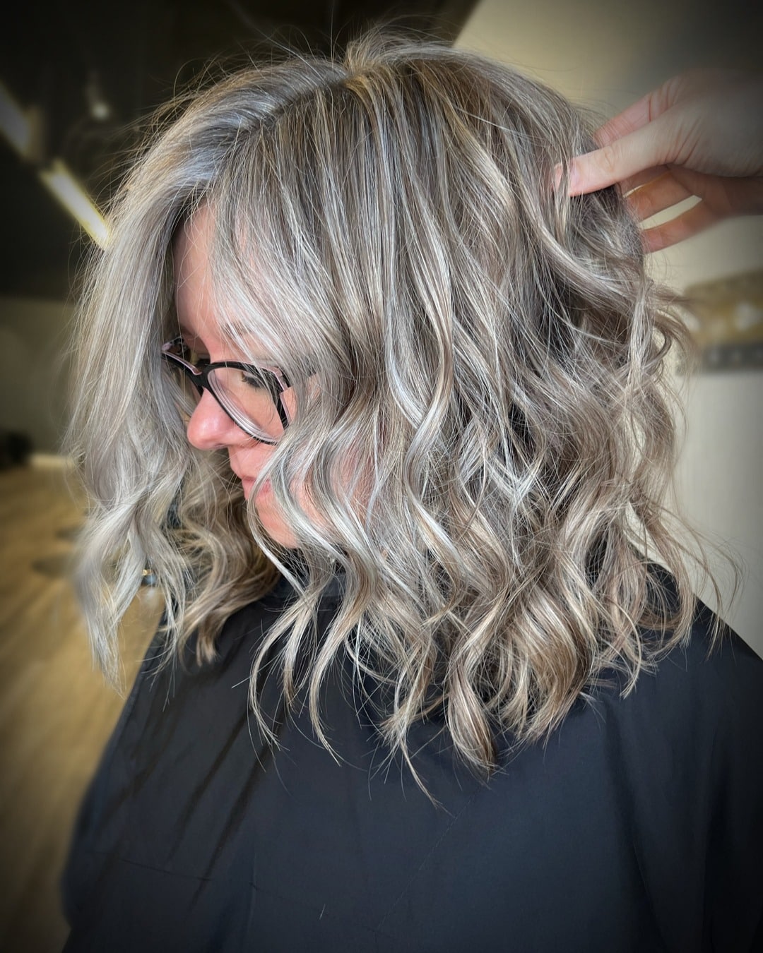 17. Soft Wavy Silver Balayage with Layered Body - Gray Hairstyles for Women
