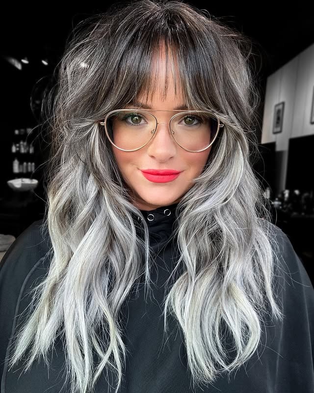 21. Long Smoky Silver Ombre with Wispy Fringe - Gray Hairstyles for Women