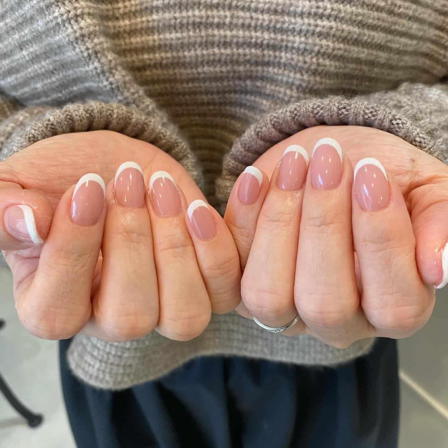 3. Short Almond French with Curved White Edges - white french nail ideas