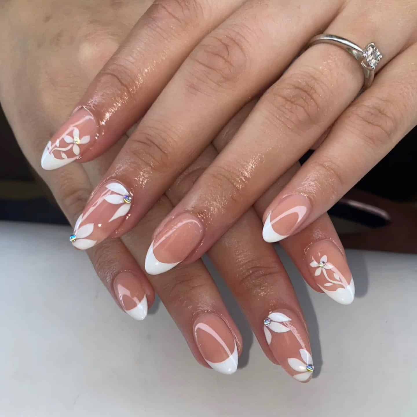 8. Floral French Almond with Hand-Painted Petals - white french nail ideas