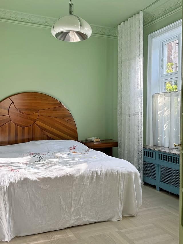 7. Minty Fresh Minimalism With Vintage Flair - greenery bedroom ideas