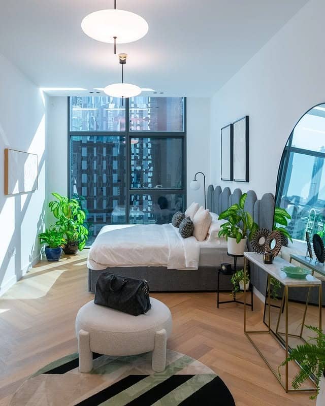 10. Modern Green City Escape - greenery bedroom ideas
