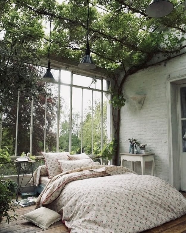 13. Greenhouse Bedroom With Vintage Floral Charm - greenery bedroom ideas