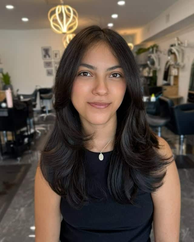 7. Classic Dark Layers with Polished Round Styling - Medium-Length Layered Haircuts