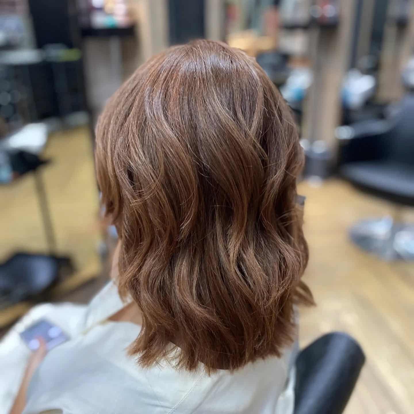 19. Warm Copper Wavy Layers - Medium-Length Layered Haircuts