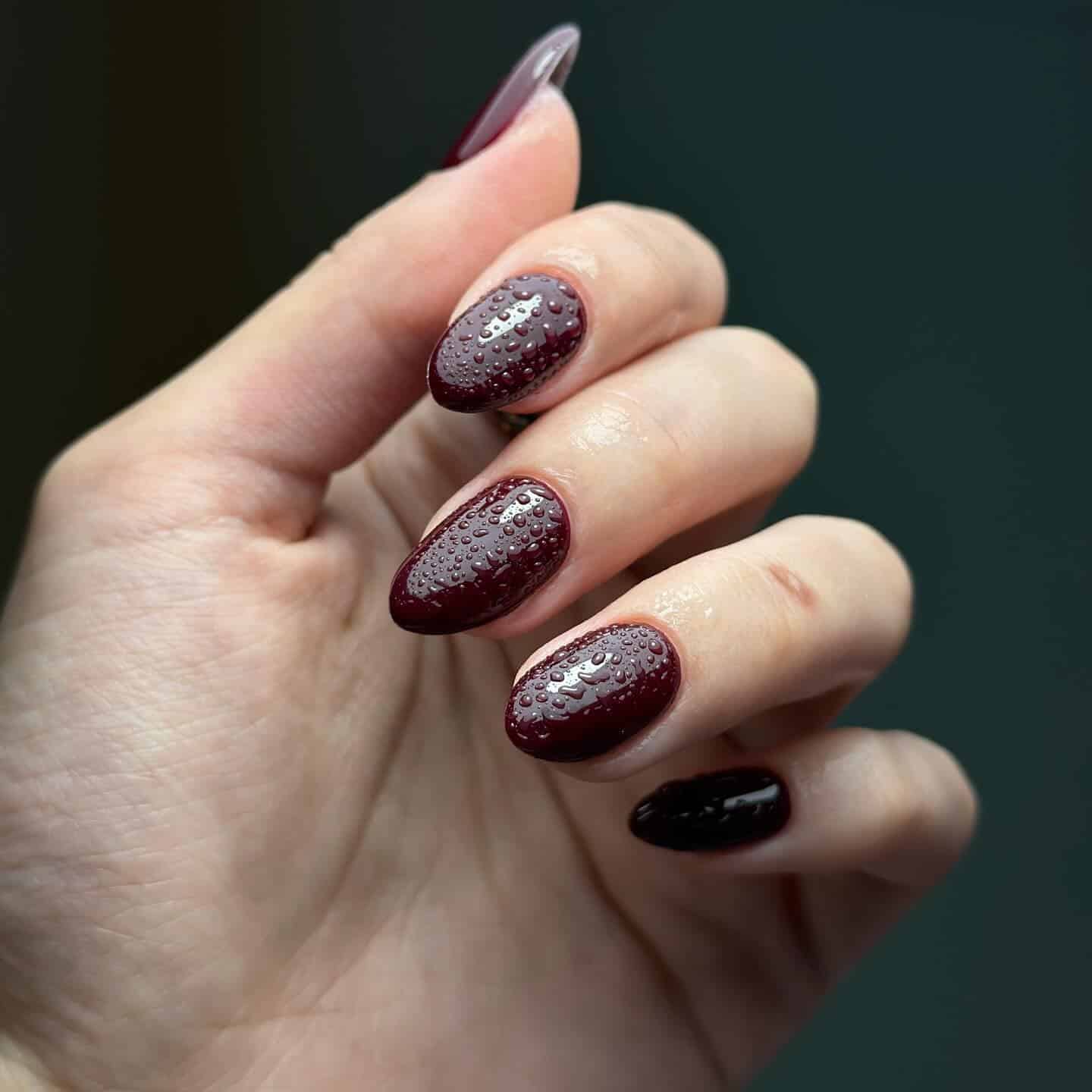 8. Textured Wine Droplet Art - wine color nail ideas