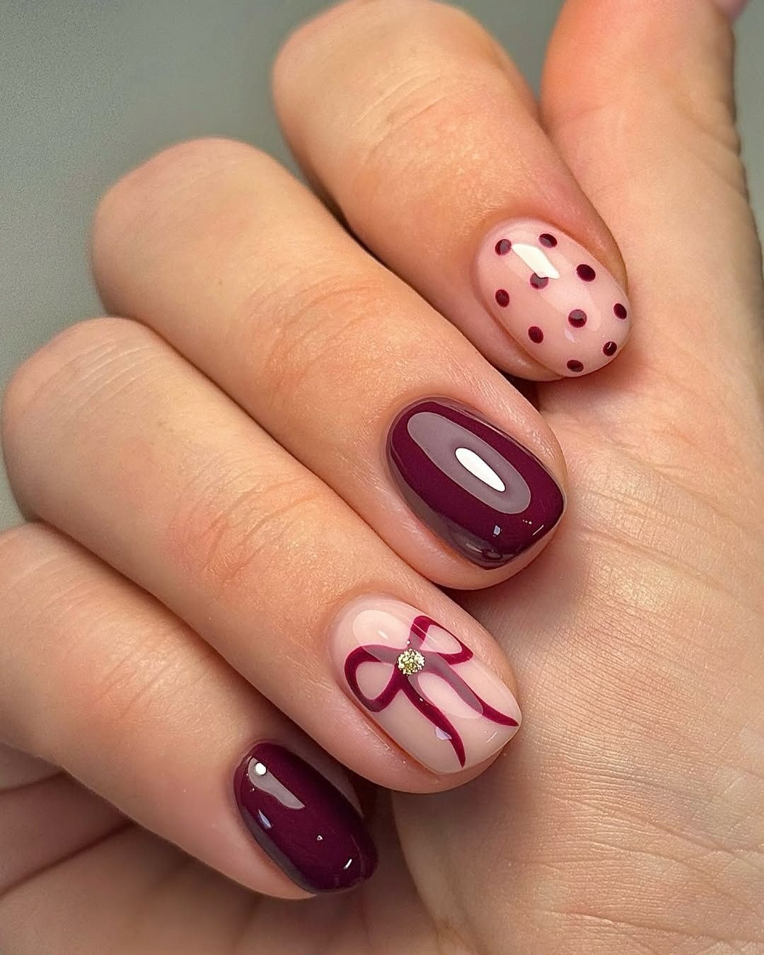 14. Short Wine Mix With Bow & Dots - wine color nail ideas