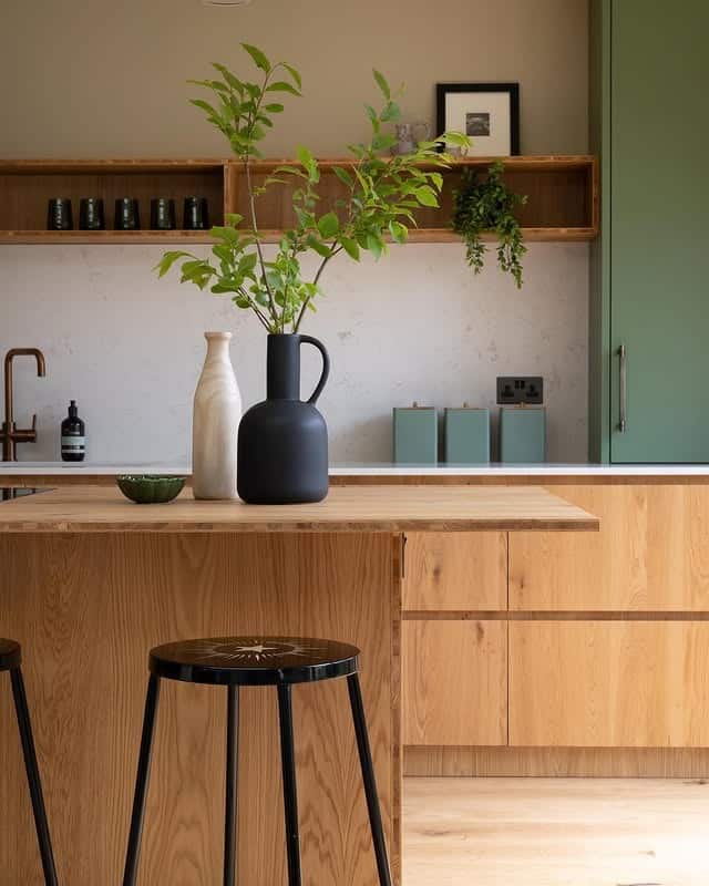 12. Modern Oak Kitchen With Soft Green Cabinet Detailing - wooden kitchen ideas