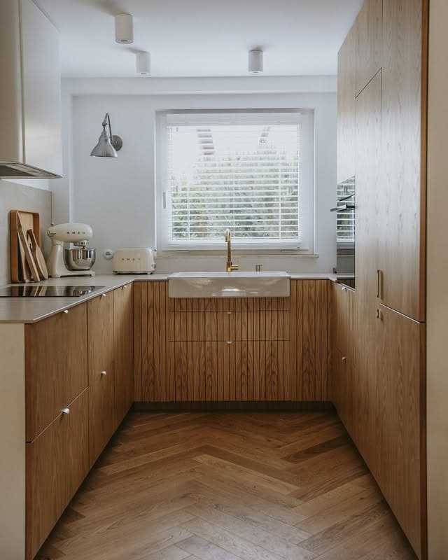 13. Compact Wood Kitchen With Brass Accents - wooden kitchen ideas