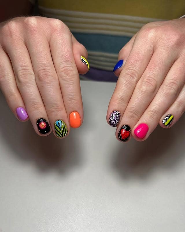 3. Vibrant Tribal Mix Short Nails - african nail ideas