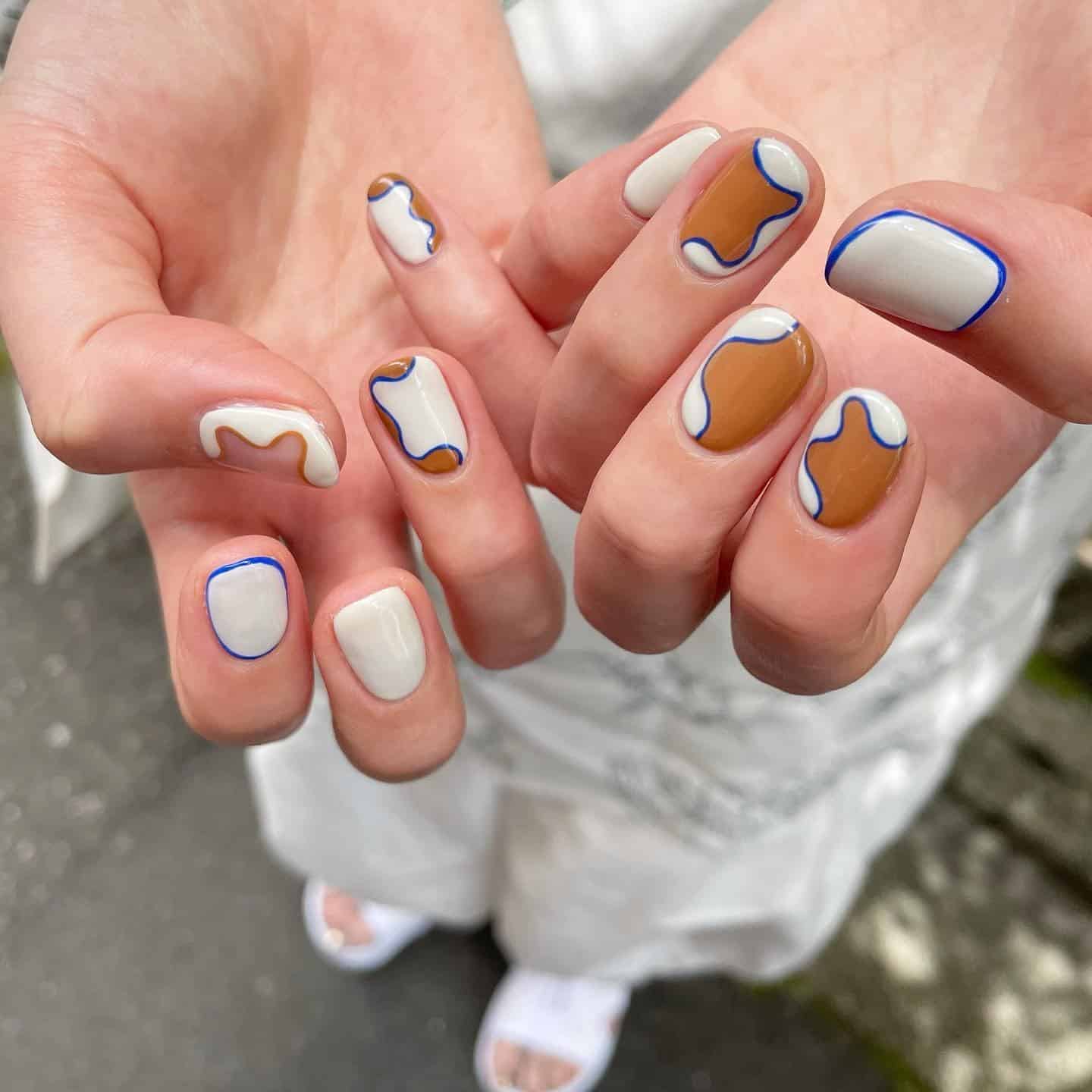 18. Clay & Ivory Abstract Frames - african nail ideas