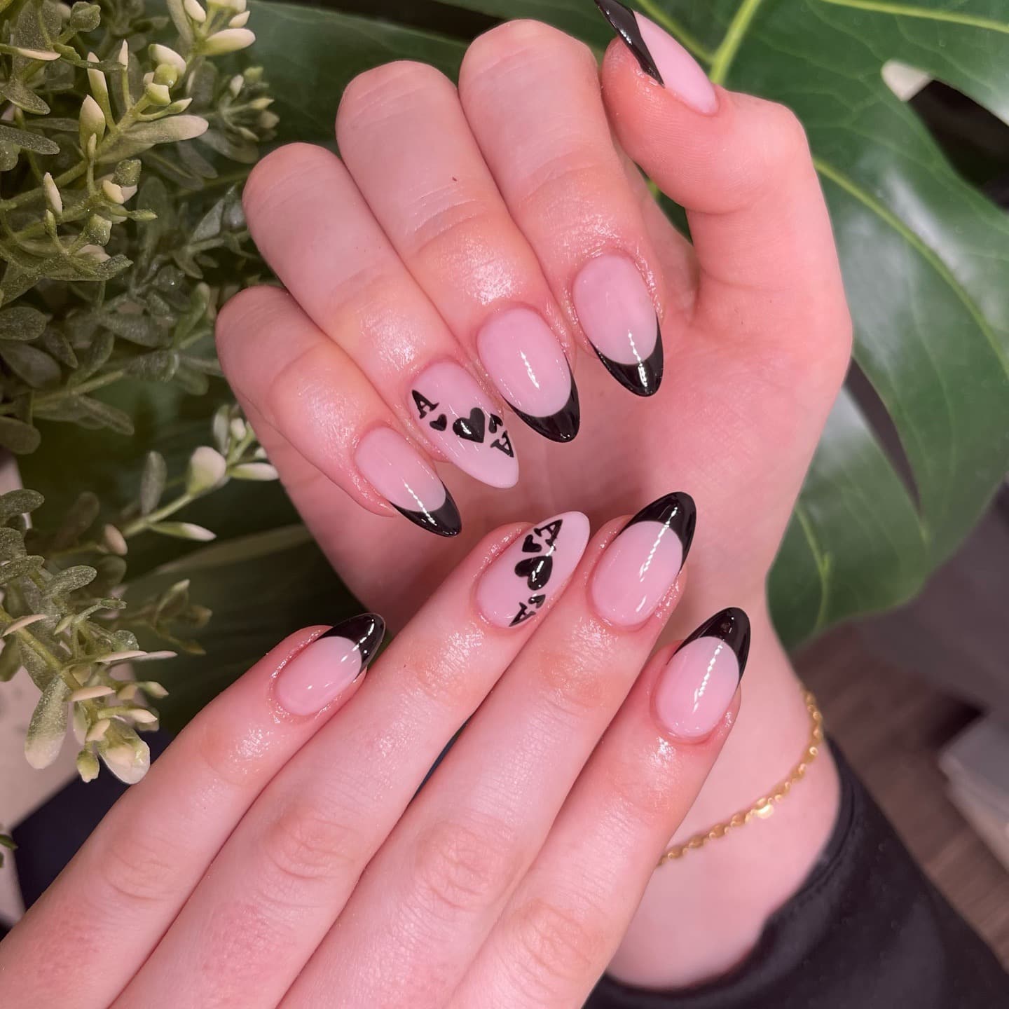 1. Black Edge Almond French Tips with Heart Accents - almond french tip nail ideas