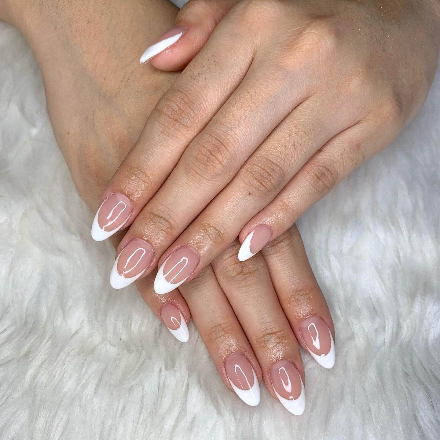 9. Classic Almond French Tips - almond french tip nail ideas