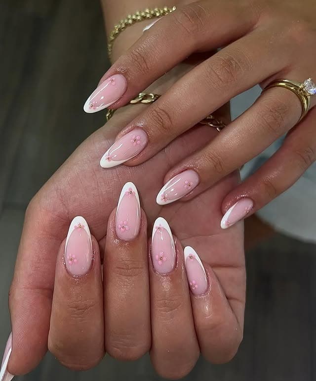 10. Soft Pink Floral Almond French Tips - almond french tip nail ideas
