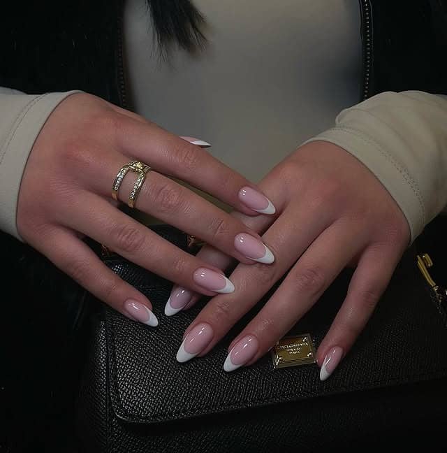 13. Classic White Almond French Tips - almond french tip nail ideas
