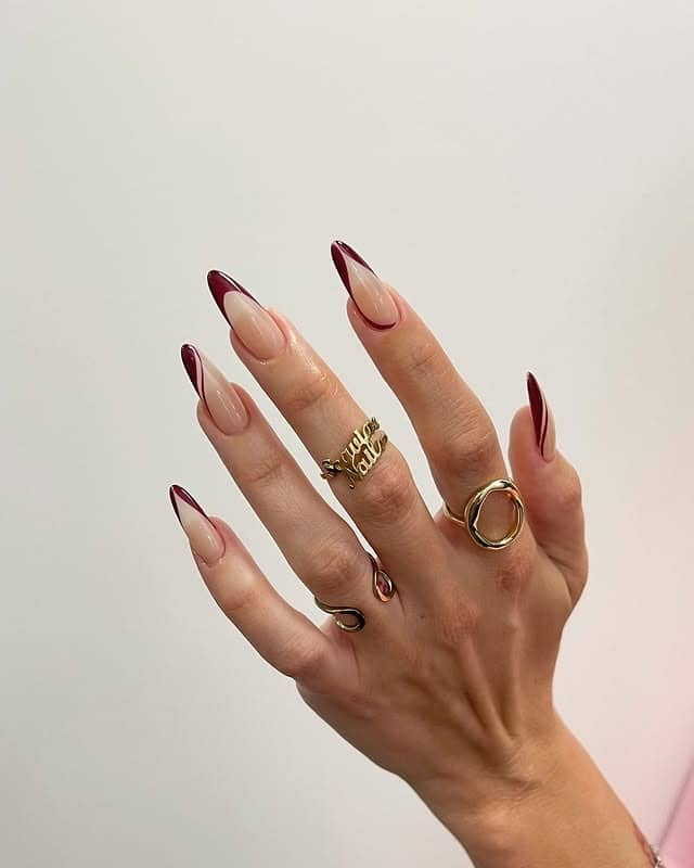 14. Deep Merlot Almond French Tips - almond french tip nail ideas