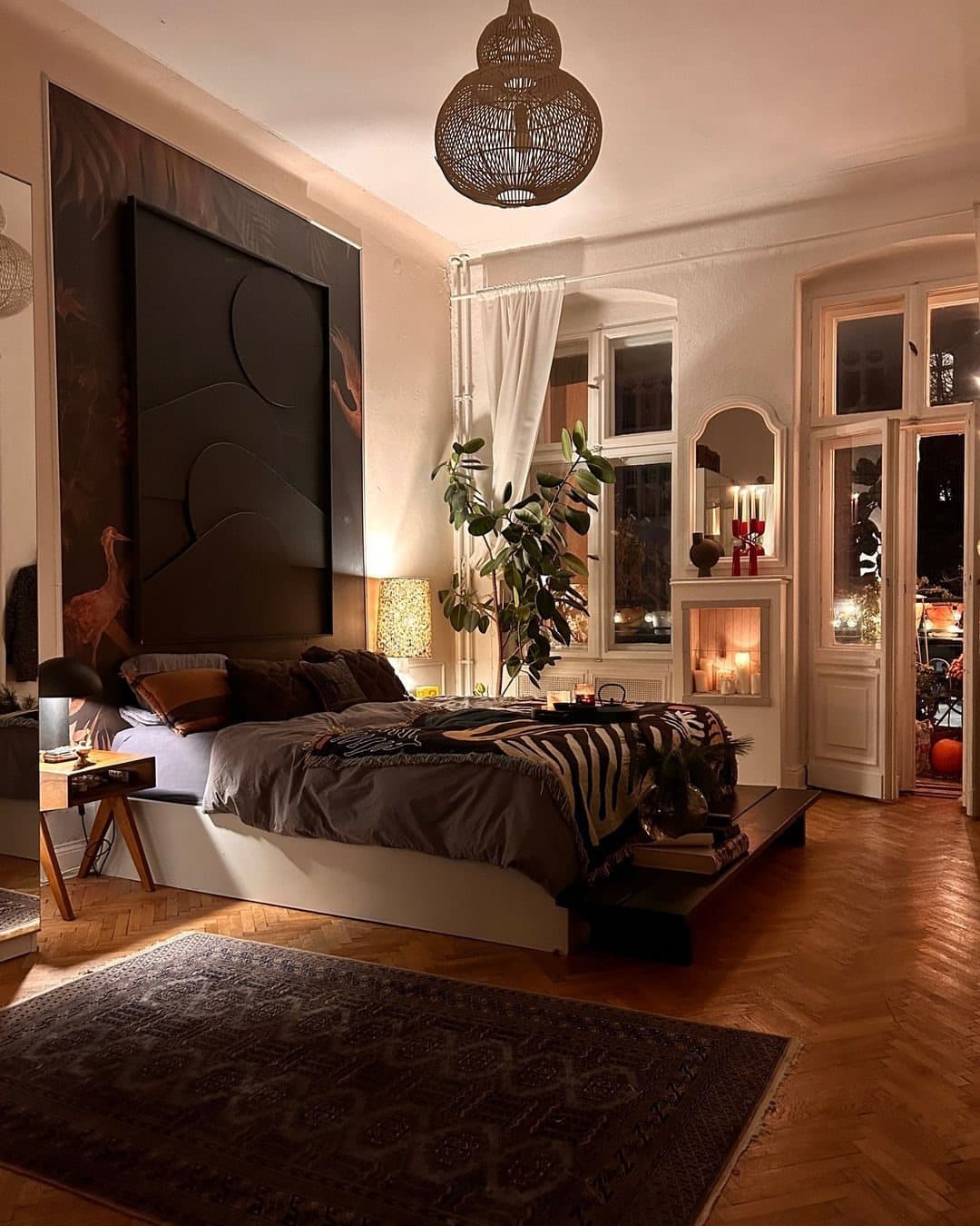 10. Warm Noir Bedroom with Ambient Glow - black and brown bedroom ideas