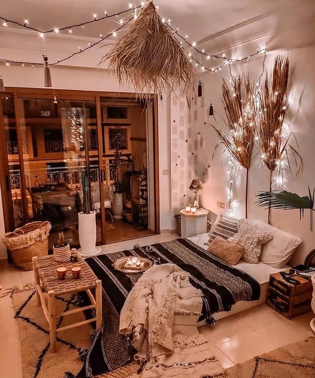 11. Boho Twilight Retreat with Warm Caramel Lighting - black and brown bedroom ideas