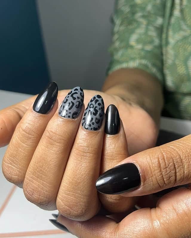 19. Charcoal Leopard With Jet-Black Shine - animal nail ideas