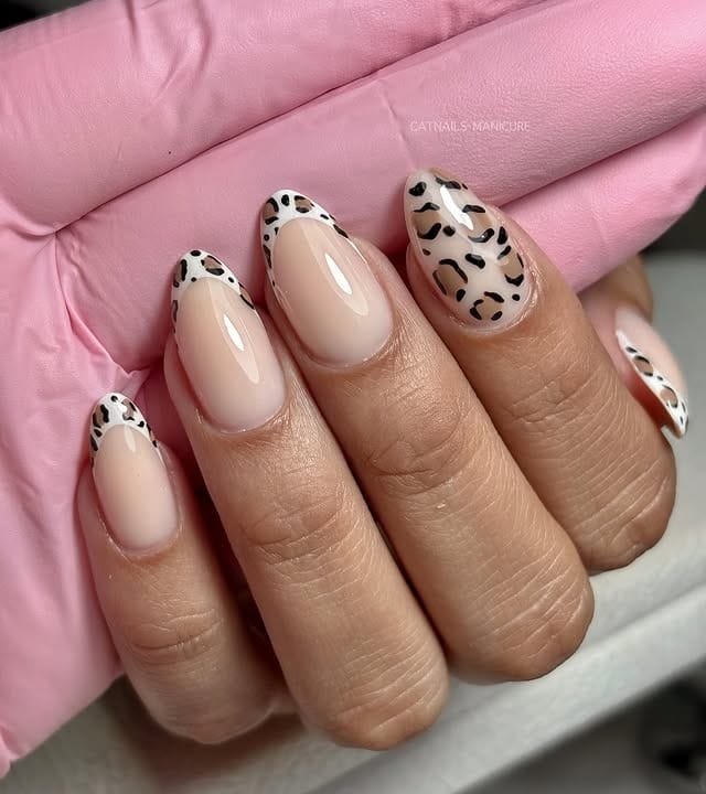 21. Soft Leopard French on Milky Nude - animal nail ideas