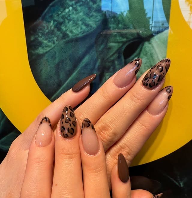 22. Chocolate Leopard Fade With Deep Brown Solids - animal nail ideas