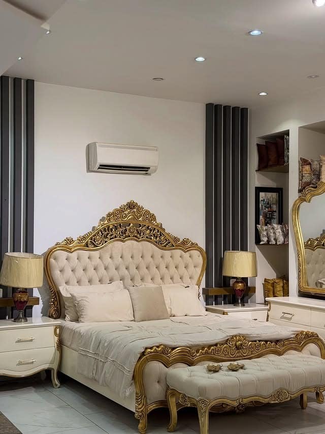 13. Ivory and Gold Tufted Elegance - royal bedroom ideas