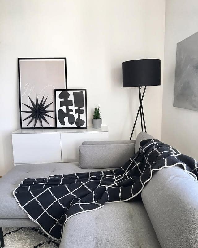 4. Minimal Grey Lounge With Graphic Accents - grey, black and white living room ideas