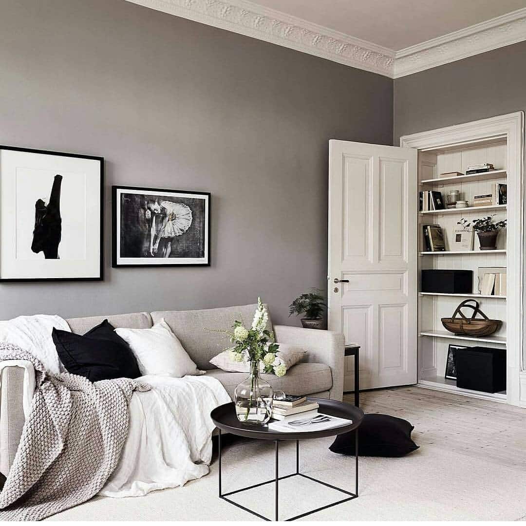 10. Warm Grey Living With Artistic Focus - grey, black and white living room ideas