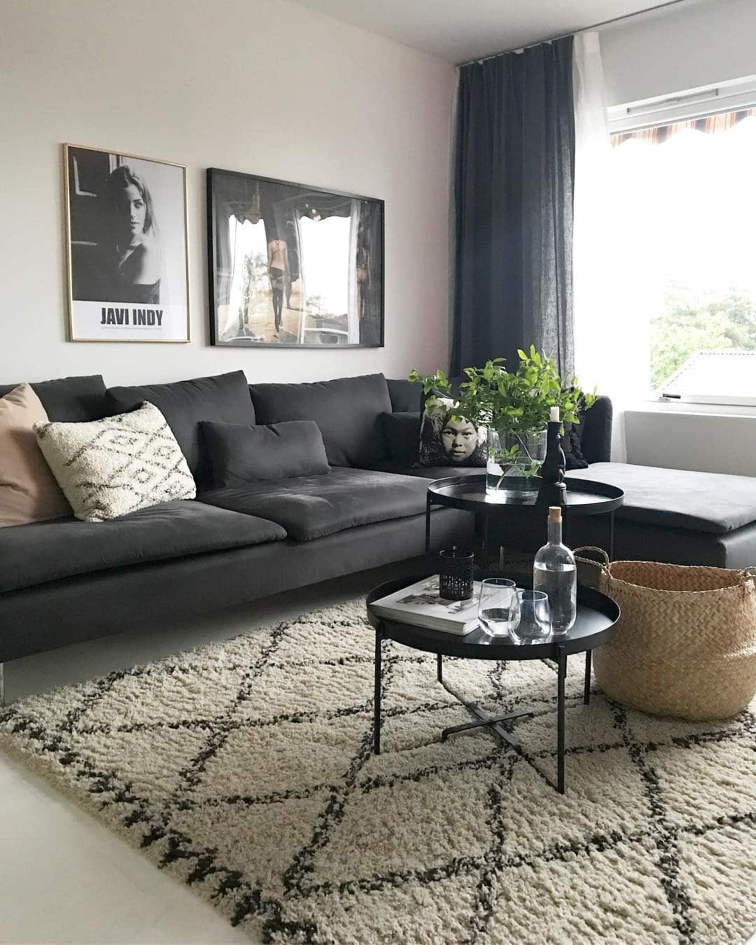 14. Relaxed Charcoal Sectional With Layered Textures - grey, black and white living room ideas