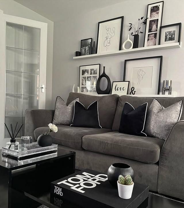 15. Monochrome Styling With Gallery Shelf Display - grey, black and white living room ideas