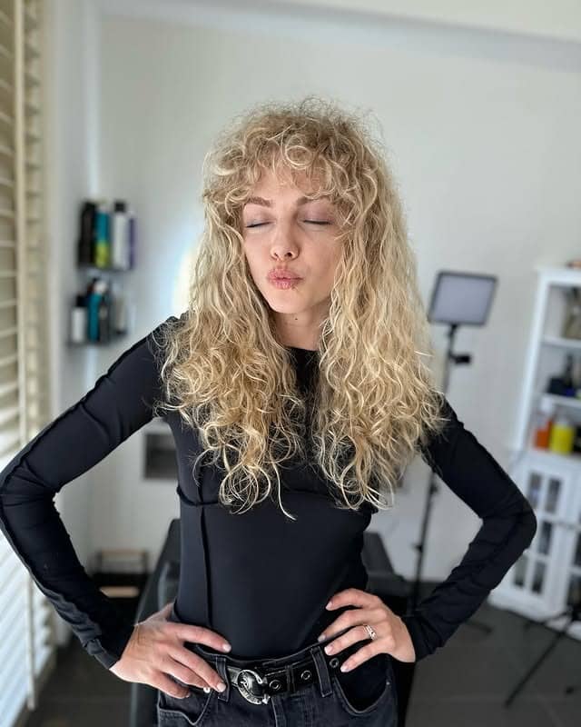 15. Light Blonde Curly Shag with Textured Fringe - Long Shag Hairstyles