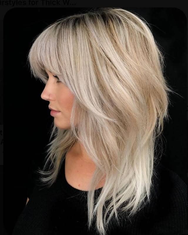 19. Platinum Beige Shag with Layered Volume - Long Shag Hairstyles